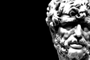 Mable bust of the famous Stoic philosopher, Seneca the Younger. Offset to the right with black background.